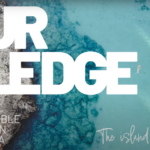 Aerial view of a rocky coastline meeting turquoise waters in Mallorca, with large white text reading “Our Pledge” and smaller text stating “Responsible Tourism in Mallorca – The island of tomorrow.”