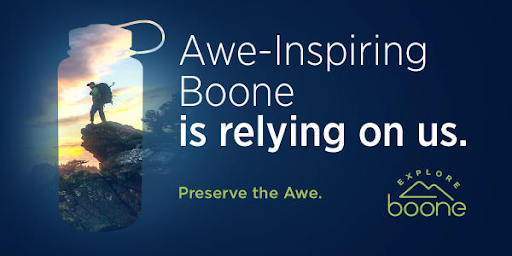Graphic promoting Boone County tourism sustainability. A hiker stands on a rocky cliff at sunset, silhouetted inside the shape of a reusable water bottle. Text reads: “Awe-Inspiring Boone is relying on us. Preserve the Awe.”
