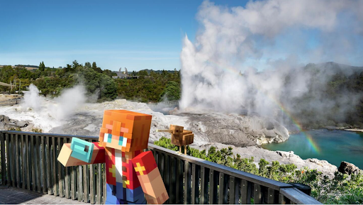 Minecraft-style character standing on a viewing platform overlooking New Zealand’s geothermal landscape, with steaming geysers, turquoise water, and lush greenery in the background.