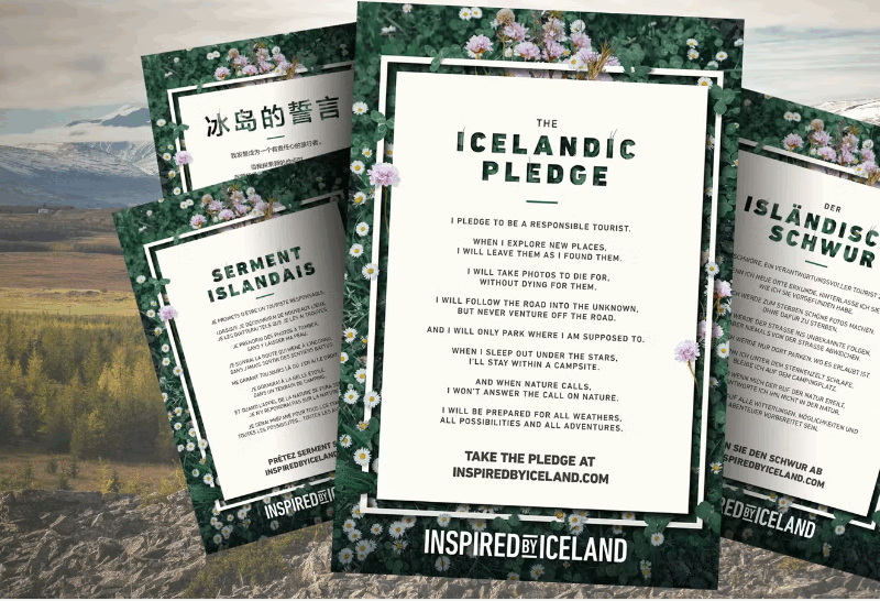 Four illustrated posters titled “The Icelandic Pledge” are displayed in English, Chinese, French, and German against a scenic Icelandic backdrop of mountains, trees, and a small building.