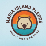 Maria Island Pledge logo featuring a wombat over a sunset and ocean, with the text “Keep It Wild & Pristine.