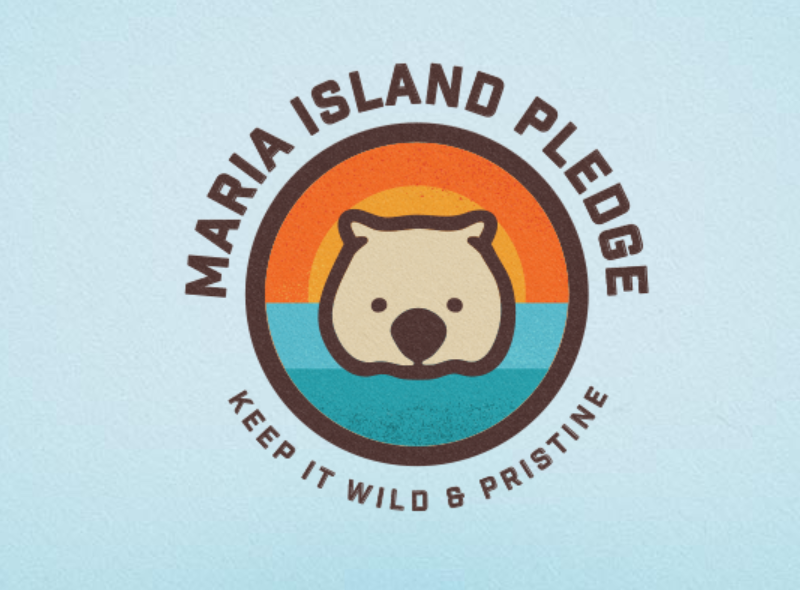 Maria Island Pledge logo featuring a wombat over a sunset and ocean, with the text “Keep It Wild & Pristine.